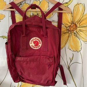 Burgundy/maroon mini fjallraven kanken backpack